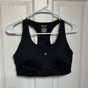Women’s Tek Gear sports bra. Zip front. Size M